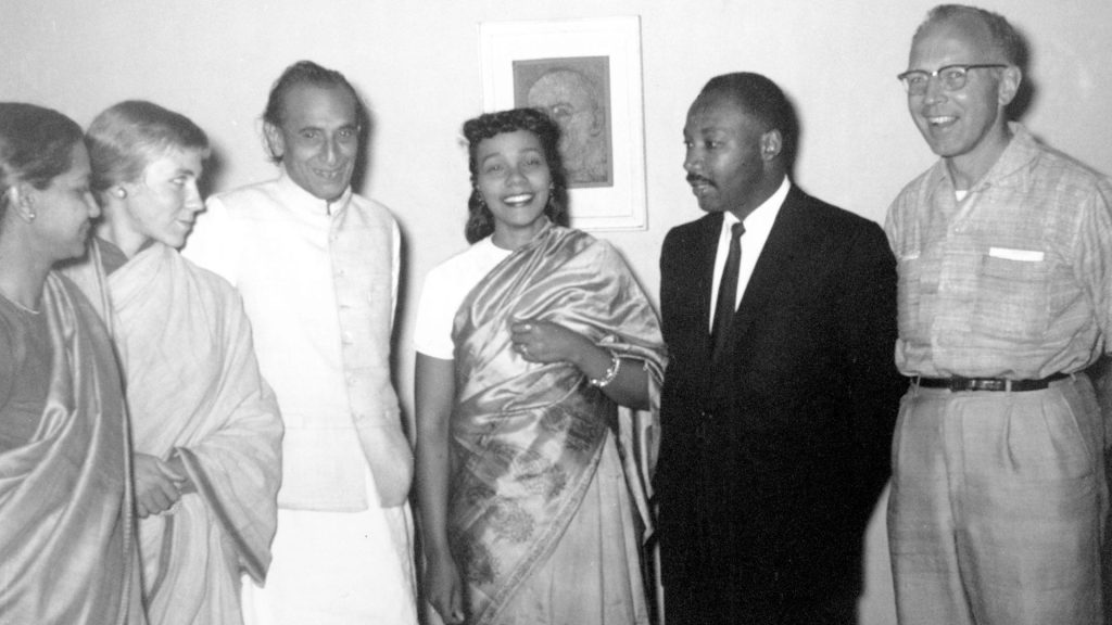 Martin Luther King, Jr. (second from right) and his wife Coretta Scott King (third from right) spent March 9, 1959, their last Indian evening, at the home of Acharya J.B. Kripalani, an interpreter of Gandhi's teachings (third from left). Others are (from left) Kripalani's secretary, Shanti; Barbara Bristol and James E. Bristol of the Quaker Centre. (Photograph © AP Images)